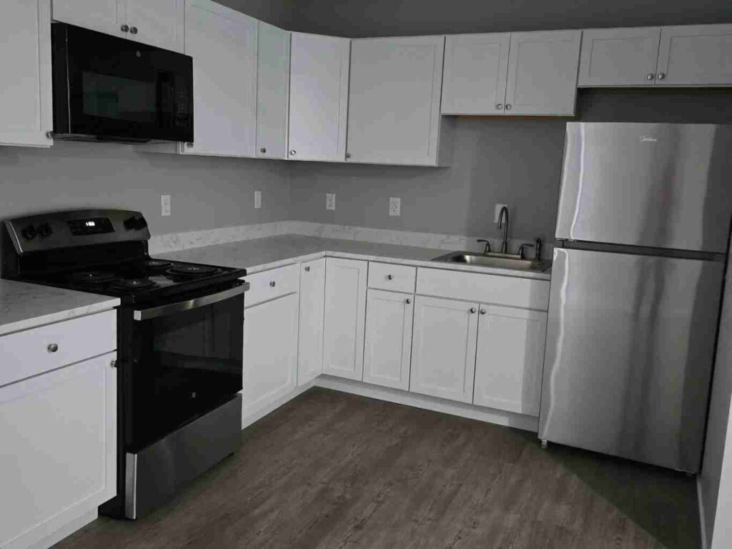 Finished home interior remodel by E & A Construction LLC featuring updated flooring, lighting, and modern design in Indiana