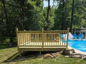 Custom-built wood deck installed by E & A Construction LLC for a home in Central Indiana