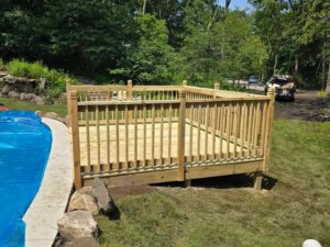 Custom-built wood deck installed by E & A Construction LLC for a home in Central Indiana