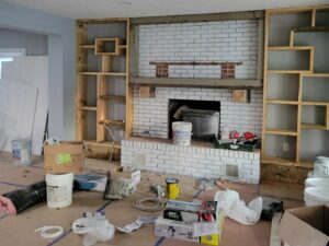 Finished home interior remodel by E & A Construction LLC featuring updated flooring, lighting, and modern design in Indiana