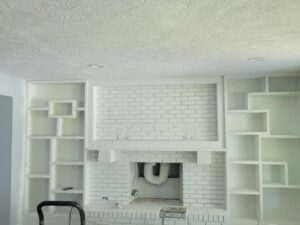 Finished home interior remodel by E & A Construction LLC featuring updated flooring, lighting, and modern design in Indiana